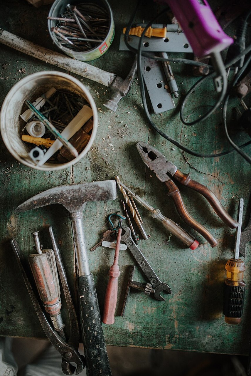 Hand tools on a workshop bench — illustrative hardware image