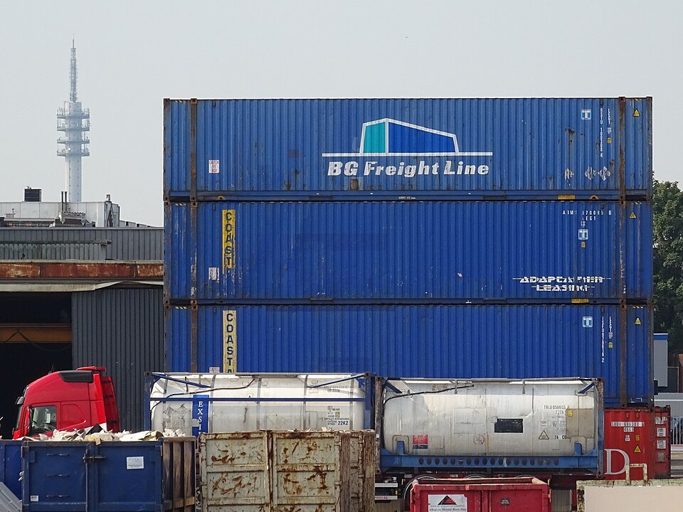 Shipping containers at a port — illustrative freight image